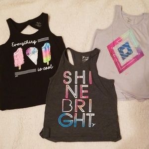 Lot of girls tank tops.